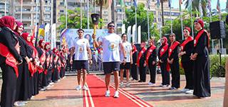 Mansoura University receives the torch of the 14th University and Higher Institutes Youth Week at the 